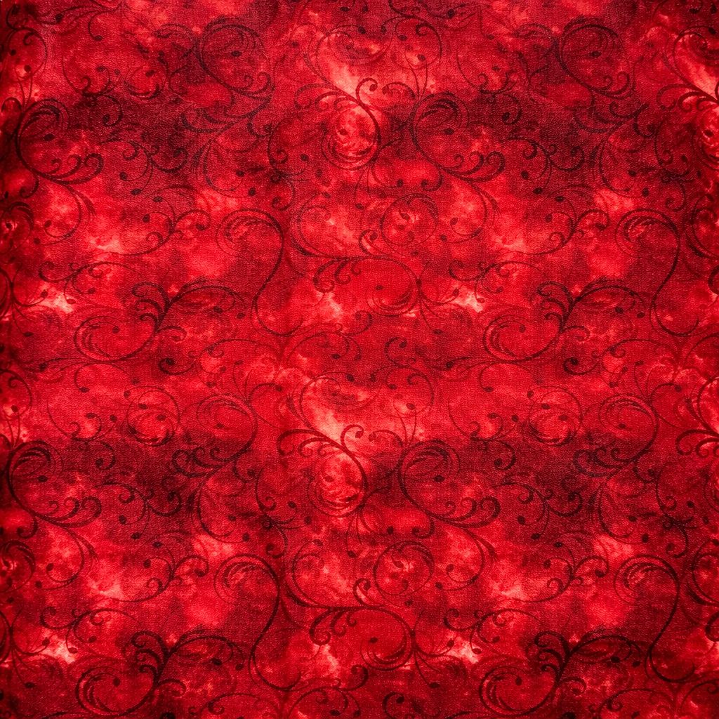 Coton imprimé rouge arabesques