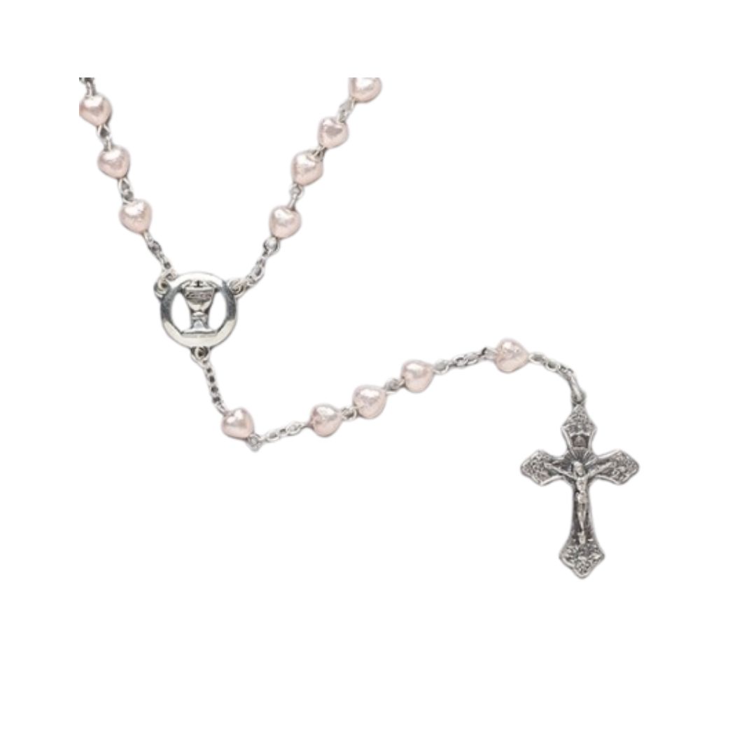 First Communion Pink Heart Rosary First Communion Heart Shaped Pink Heart Bead Rosary by Roman Inc. is an 18" long rosary with 6mm He…