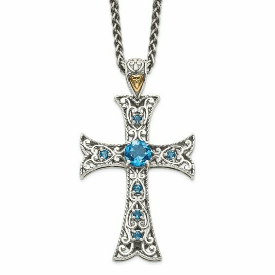 Sterling Silver cross necklace with genuine London Blue Topaz stones.