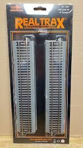 81-1001 - HO RealTrax 9" Straight Code 83 Track w/Roadbed - 4 Pack