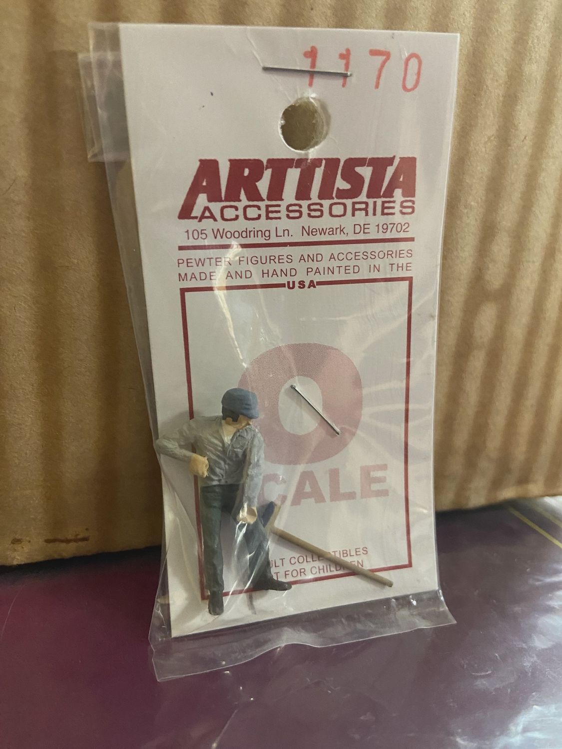 a1170 - Man Pushing Broom