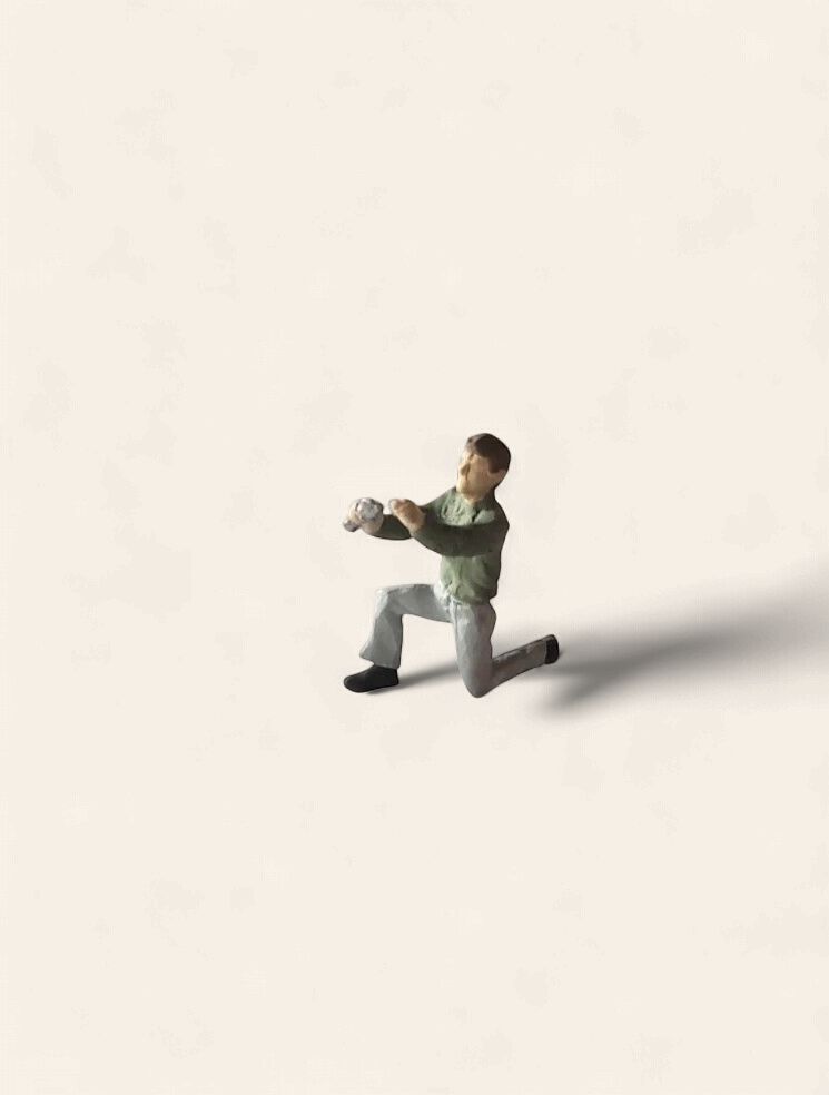 A1228 - Man on Knee with Wrench