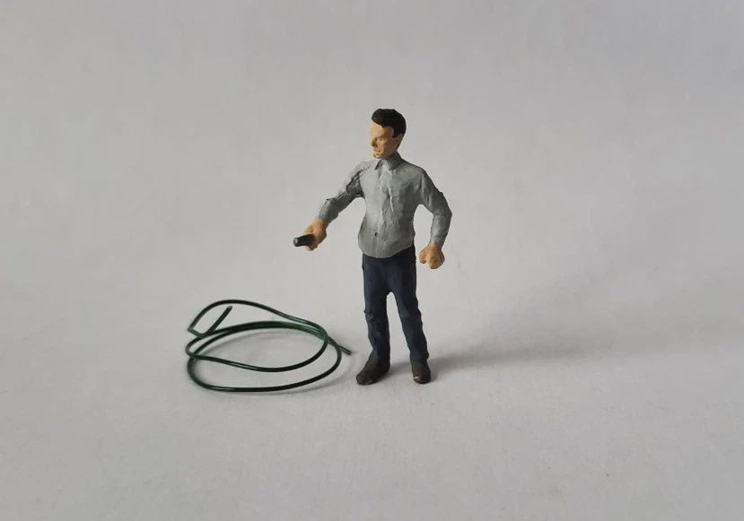 A1230 - Man with a Hose