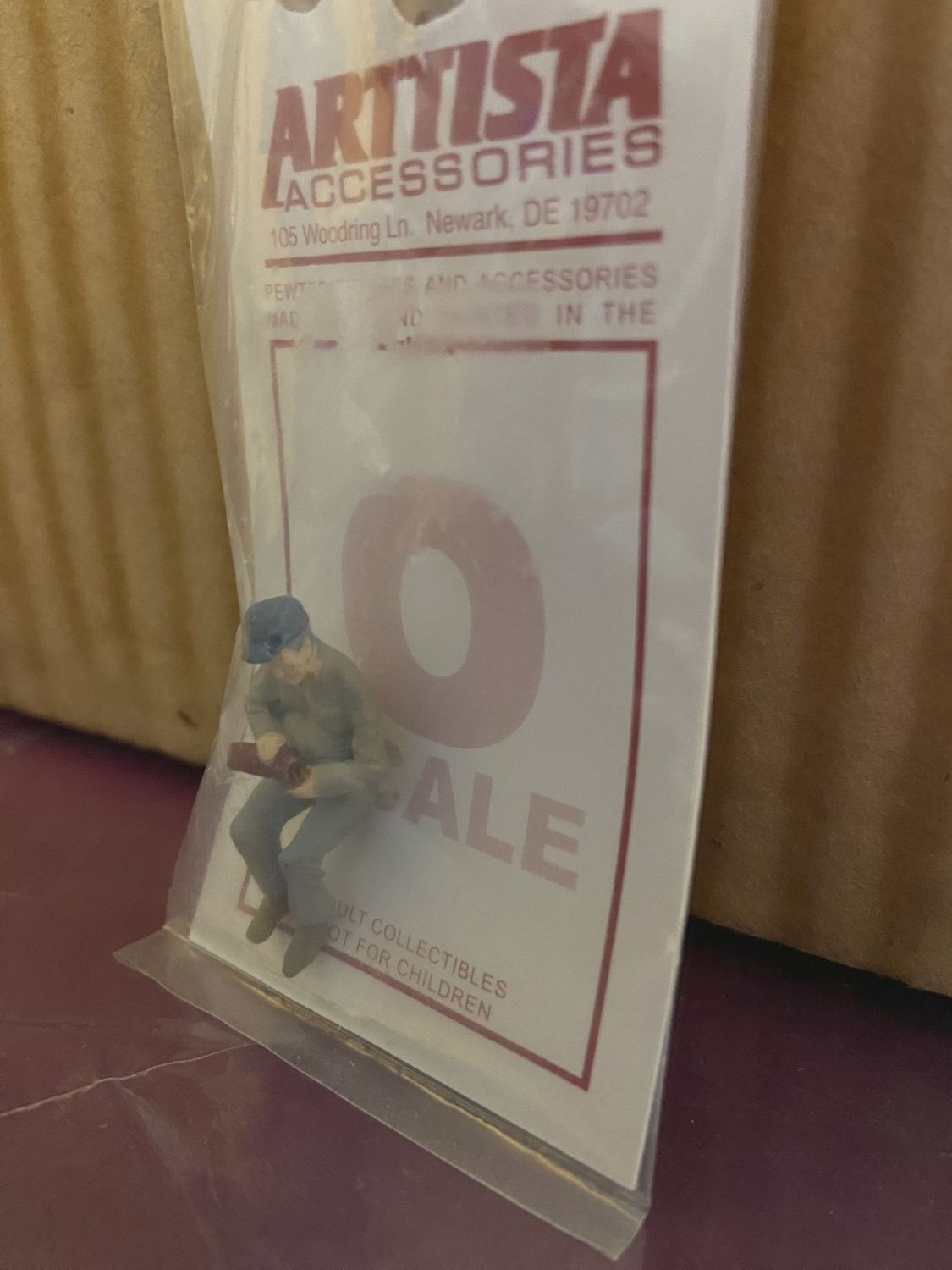 A1176 - Sitting Man with Bottle