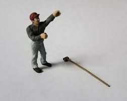 a1214 - Man Working with Long Brush