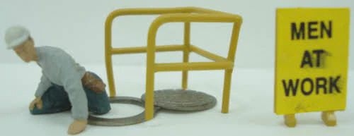 a1438 - Man Leaving Manhole