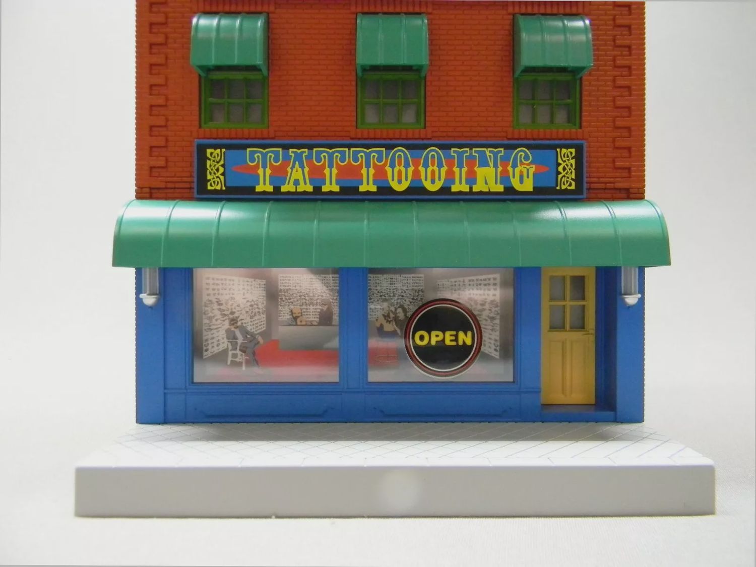 30-90566 - What were you inking - Tattoo Removal? 3-Story City Building w/Fire Escape &amp; Blinking Sign