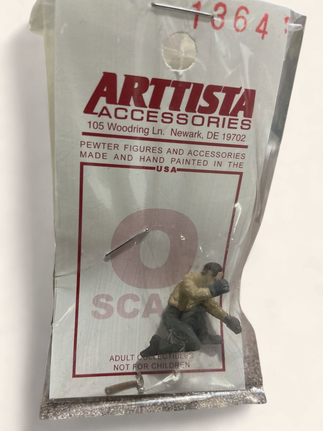 a1364 - Man Stooping With Hammer