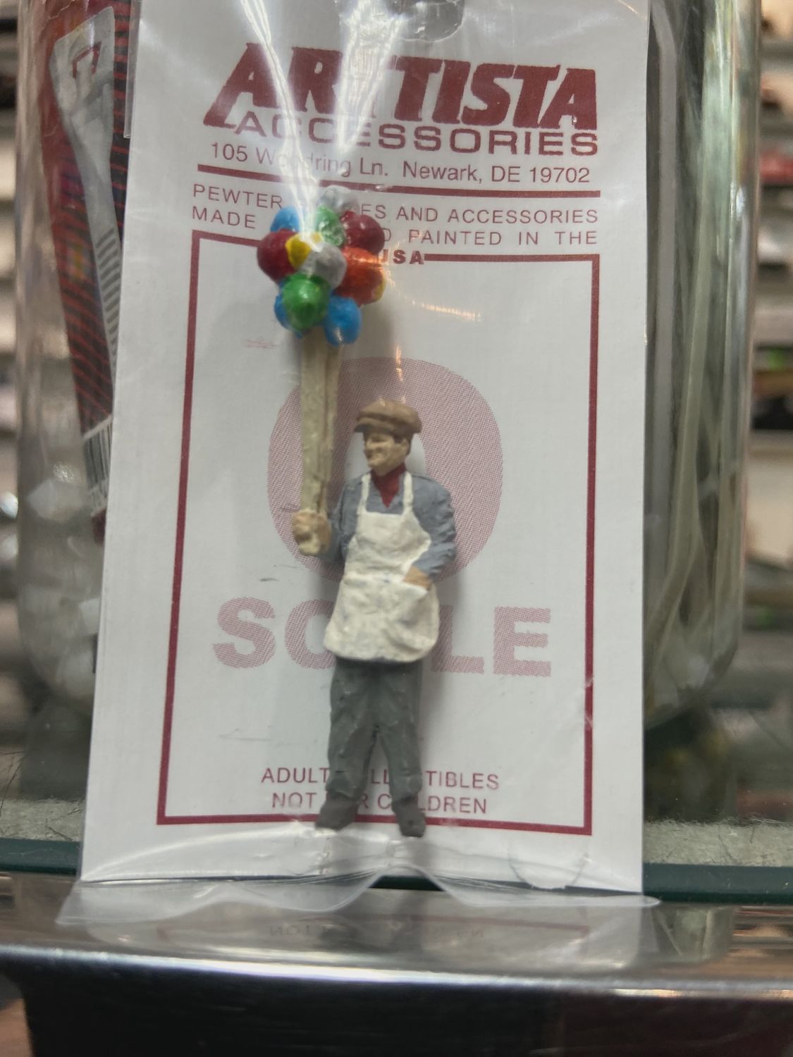 a1630 - Balloon Vendor Holding Balloons