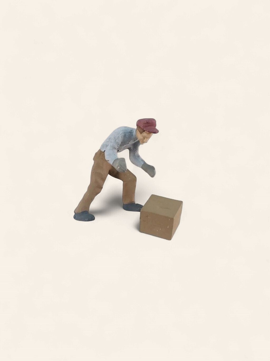A1325 - WORKER PICKING UP BOX
