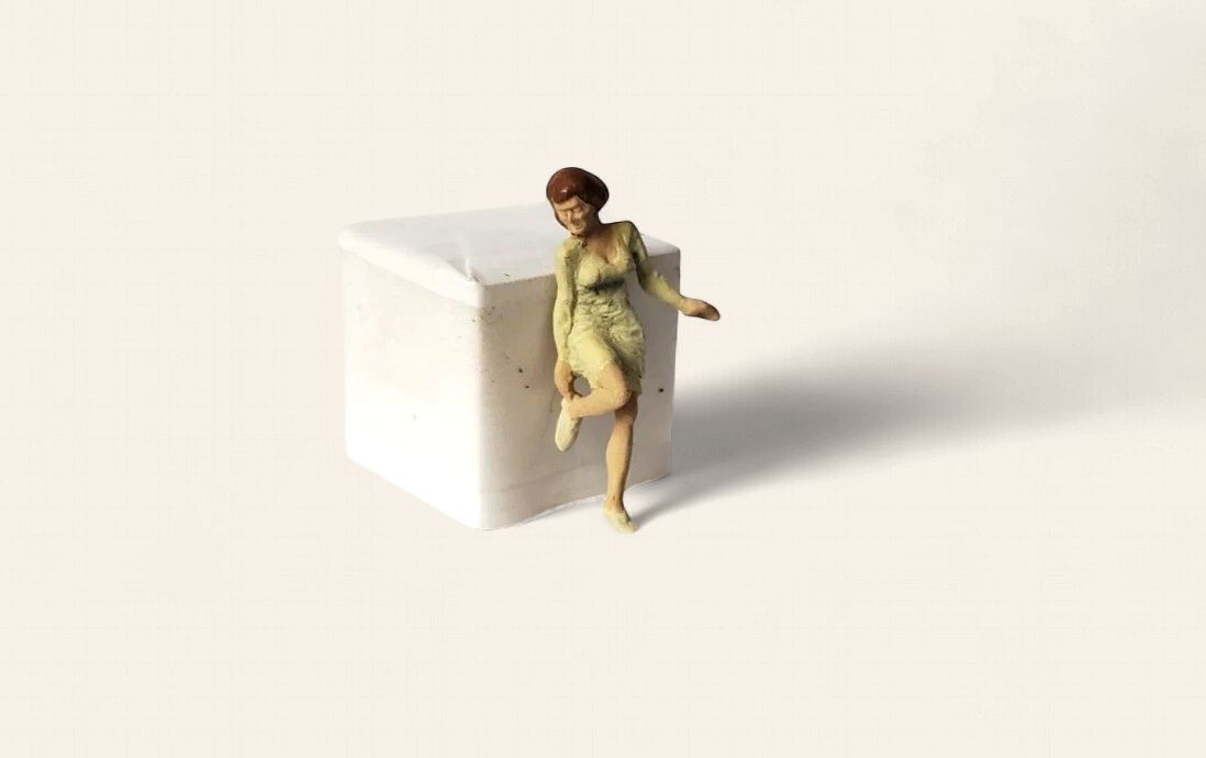 A1483 - Woman Fixing Shoe