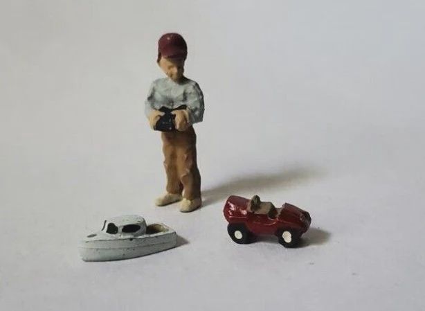 A1558 - Boy with Radio Control Car &amp; Boat
