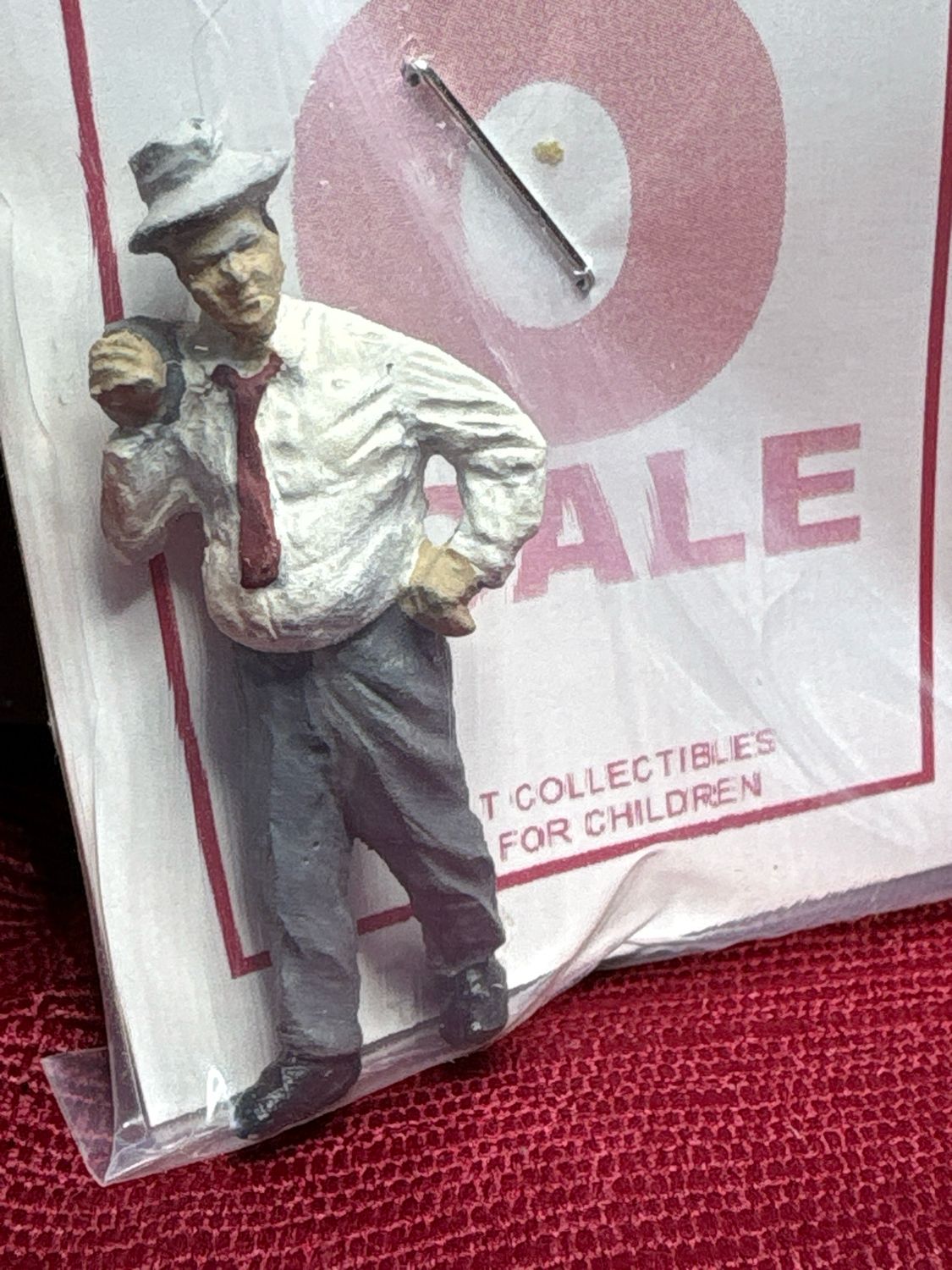 1652 - Walking man w/jacket slung