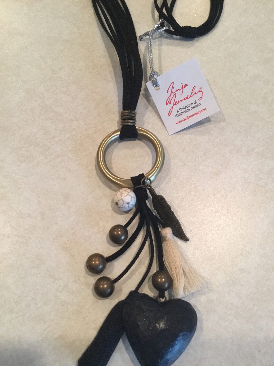 Boho Necklace With Wooden Heart, Charms And Tassels.