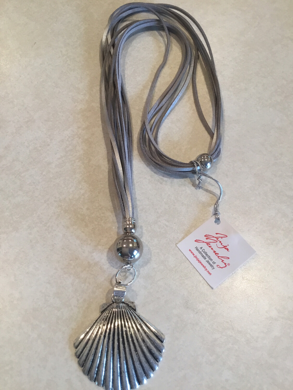 Long Five Strand Leather Necklace With Fan Shell
