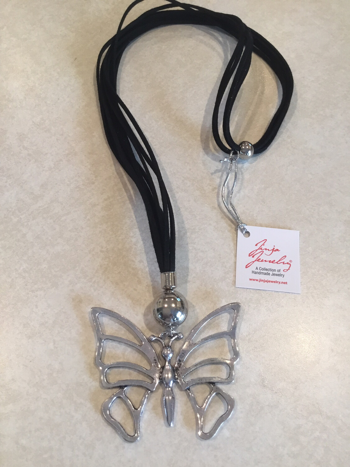 Long Five Strand Leather Necklace With Butterfly Pendant