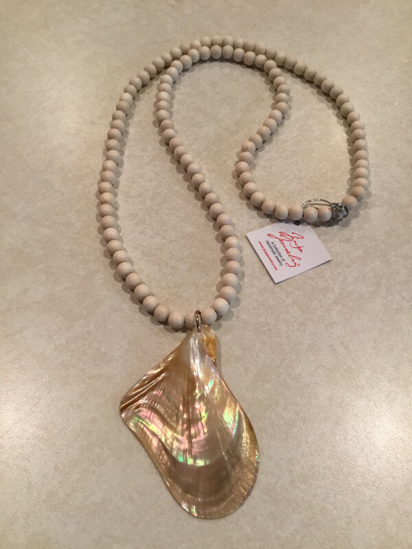 Long White Wood Beaded Necklace Featuring Large Abstract Natural Brown Mother Of Pearl Pendant.