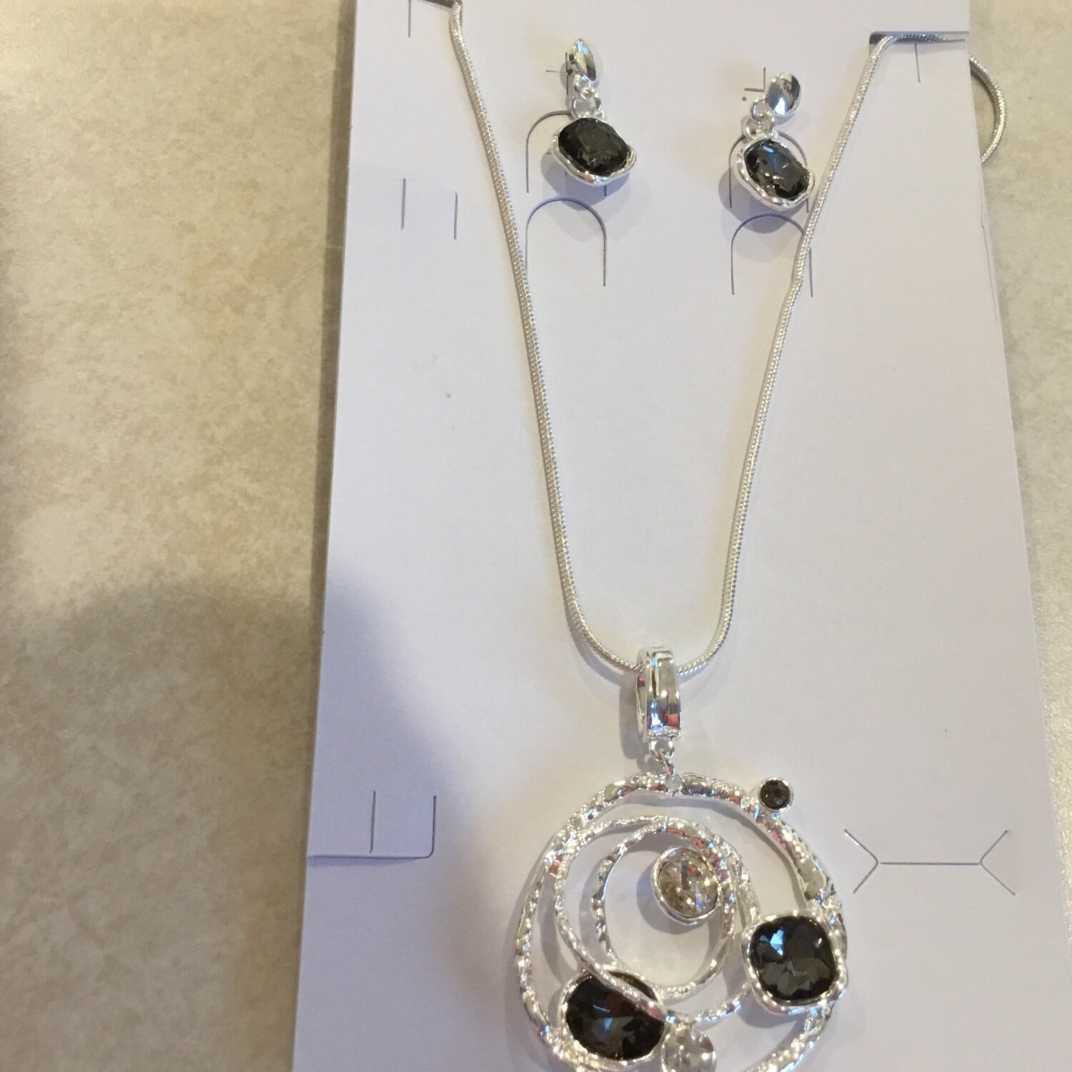 Necklace And Earrings Set With Circles And Smoky Crystal