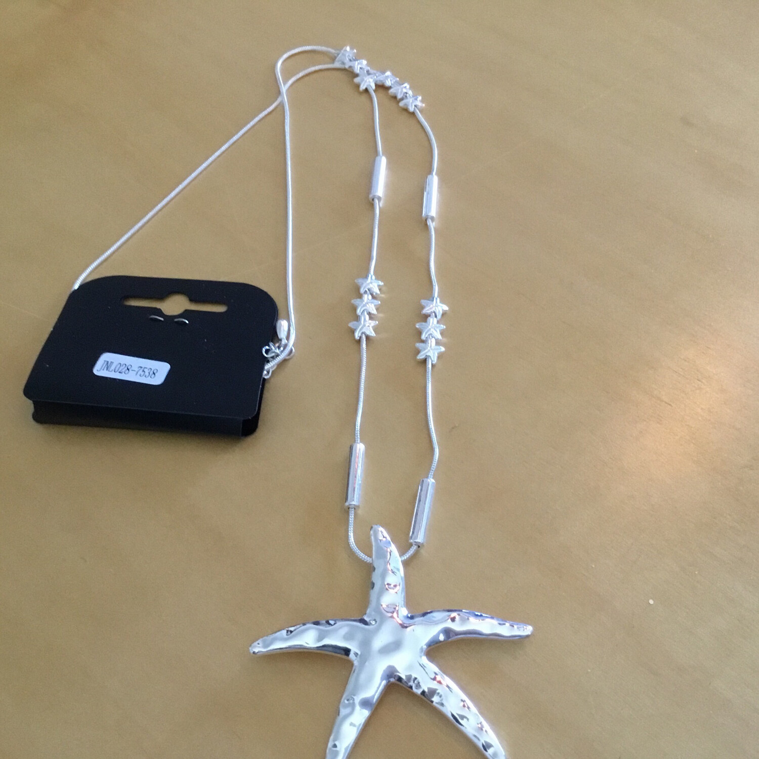 Silver Long Necklace With Stars And Starfish Pendant