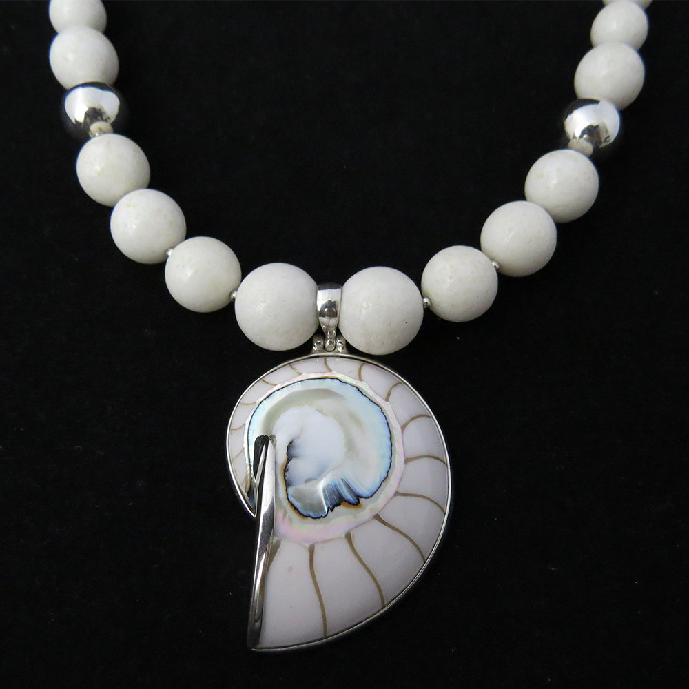 White Coral with White Nautilus Shell