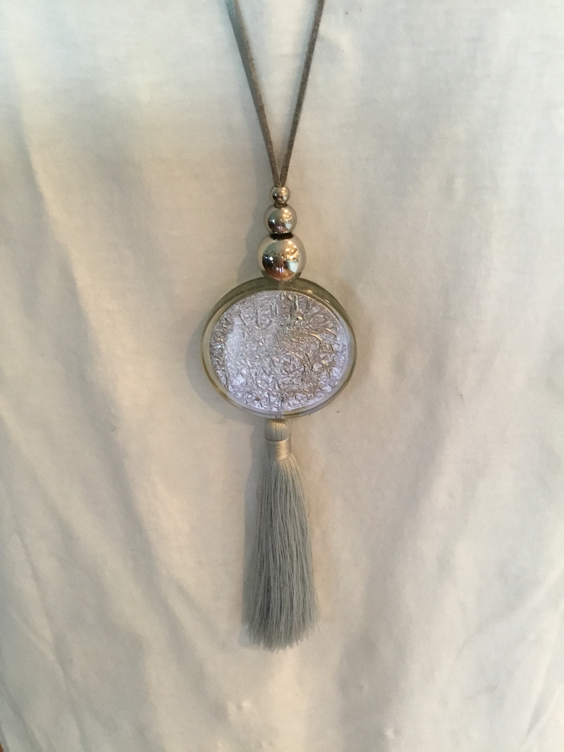 Silver Leather Silver Disk And Tassel