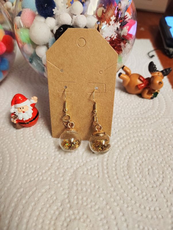 Gold star ornament globe earrings New Years