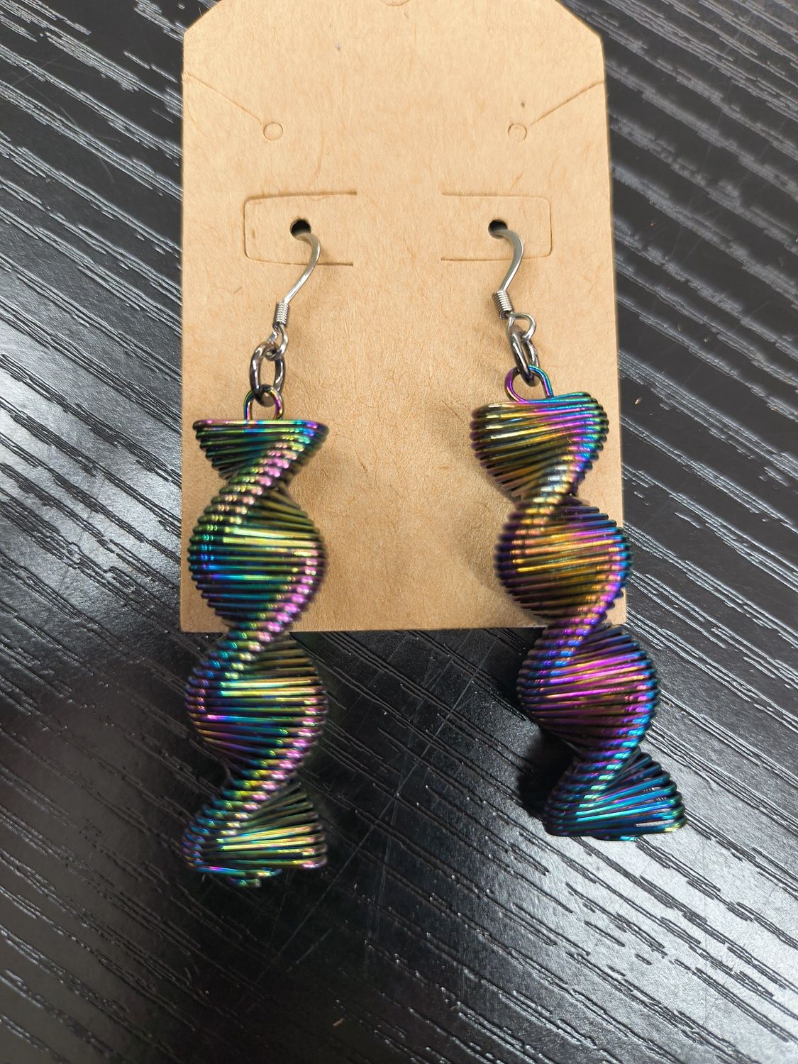 "Chimed to meet you" Rainbow swirling metal earrings