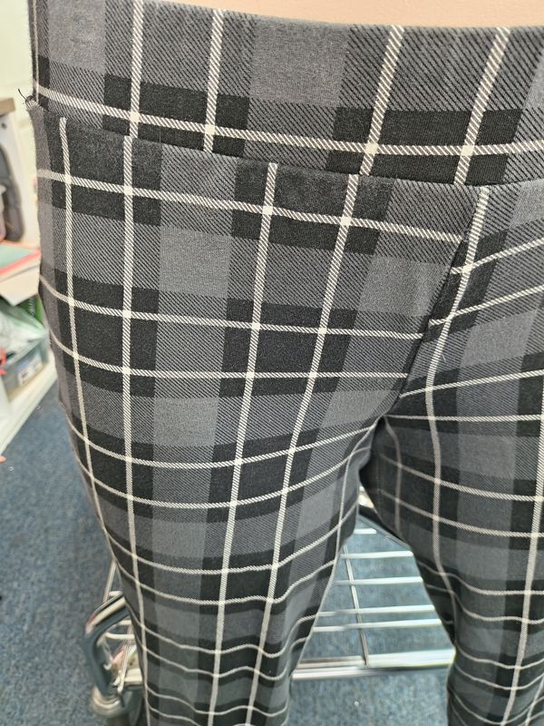 2x Torrid gray and black plaid knit leggings