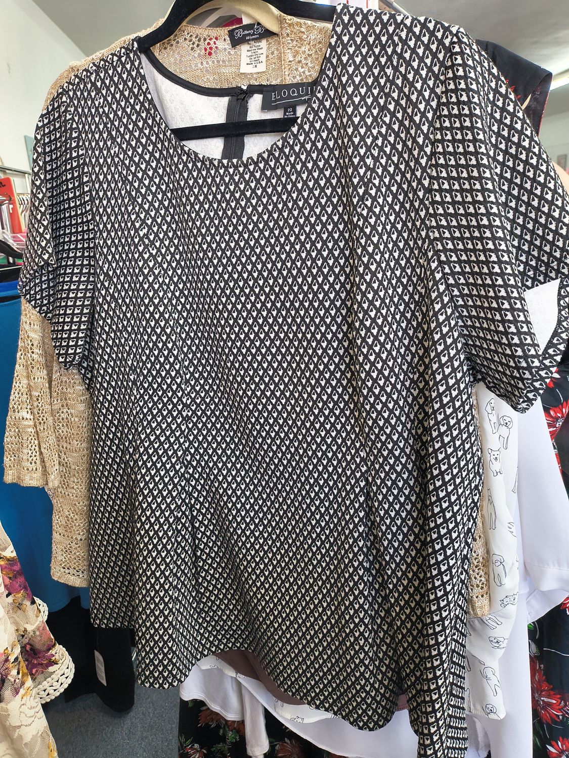 Size 22 Eloquii black and white pattern peplum top