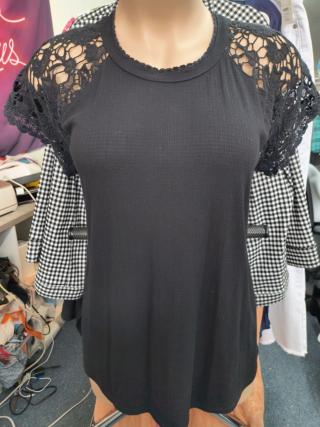 Size 3x Torrid black ribbed top with embroidered sleeves