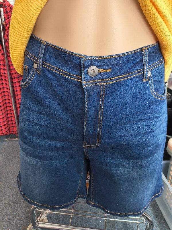Size 18 Bloomchic denim shorts with flowers on pocket