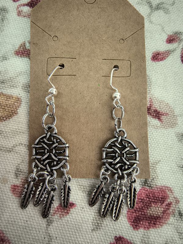 Metal dreamcatchers with feathers handmade silver earrings
