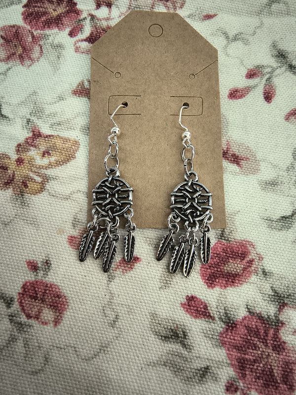 Metal dreamcatchers with feathers handmade silver earrings