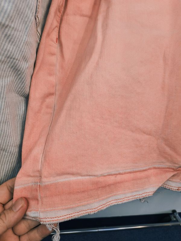 Size 14 Lane Bryant pink distressed denim bermuda shorts