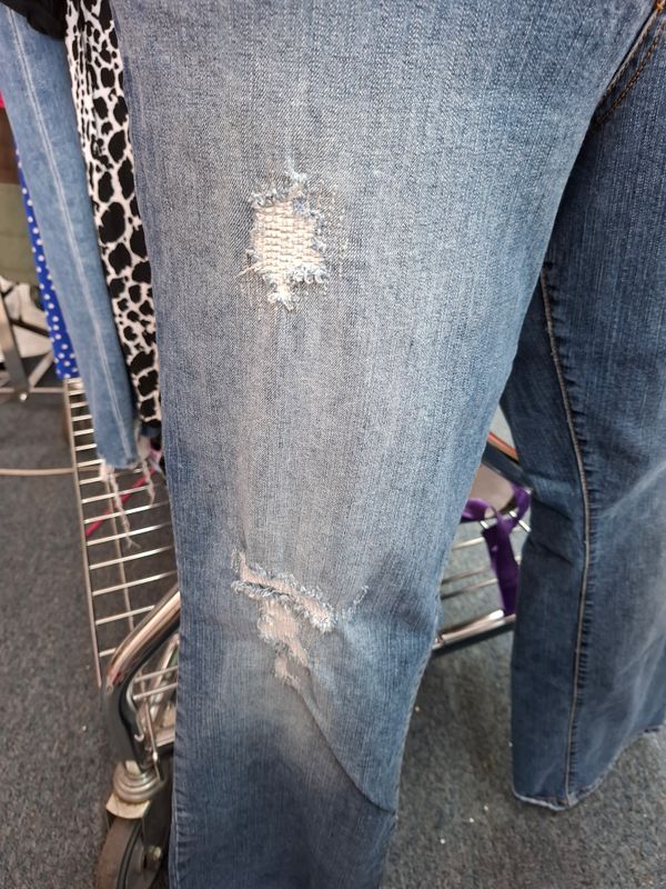 Size 14 Torrid relaxed boot cut distressed jeans