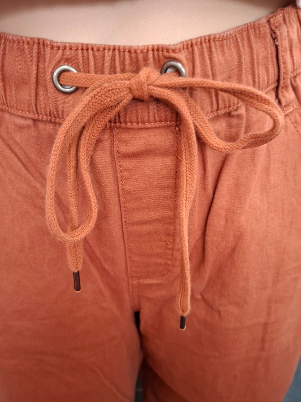 L 12/14 Cato orange flare pants jeans pull on