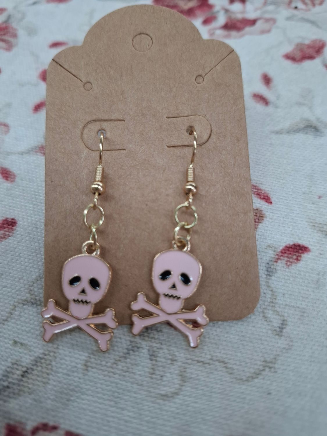 "Dead Tired" Light pink and gold skulls Halloween earrings