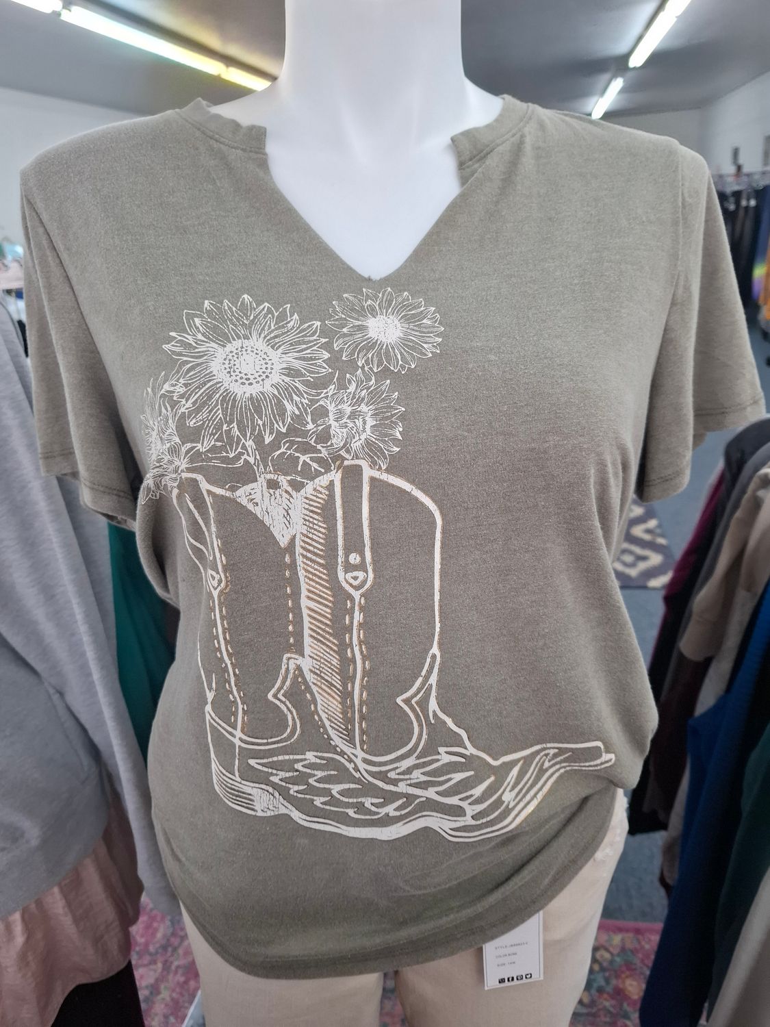 0x Maurices green v-neck boots and flowers graphic tee