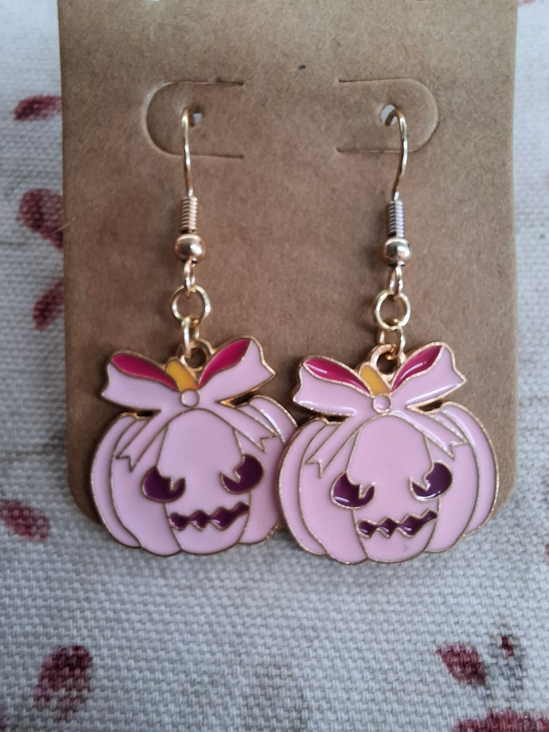 Pink Jack O' Lantern pumpkins with bows earrings
