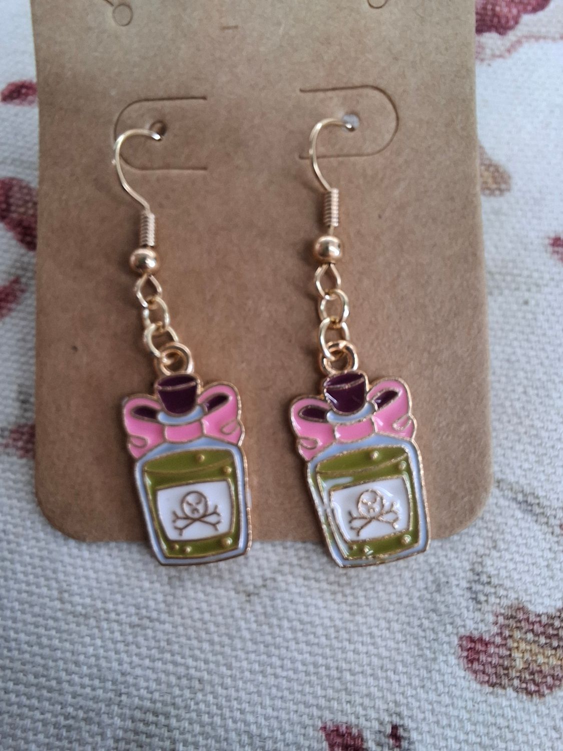 Pink and green potion bottles Halloween earrings