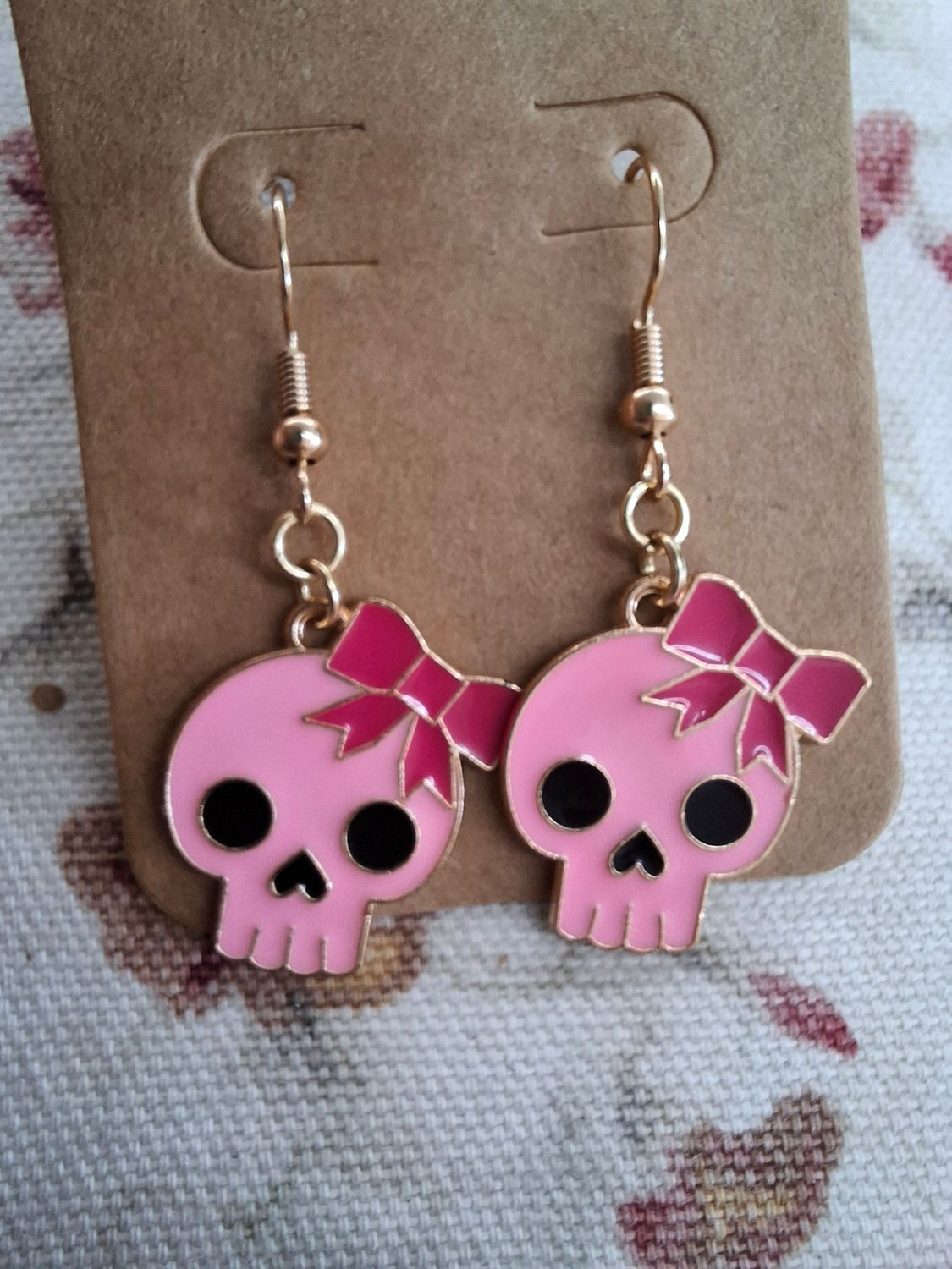 "Drop dead gorgeous" Pink bow skull Halloween earrings