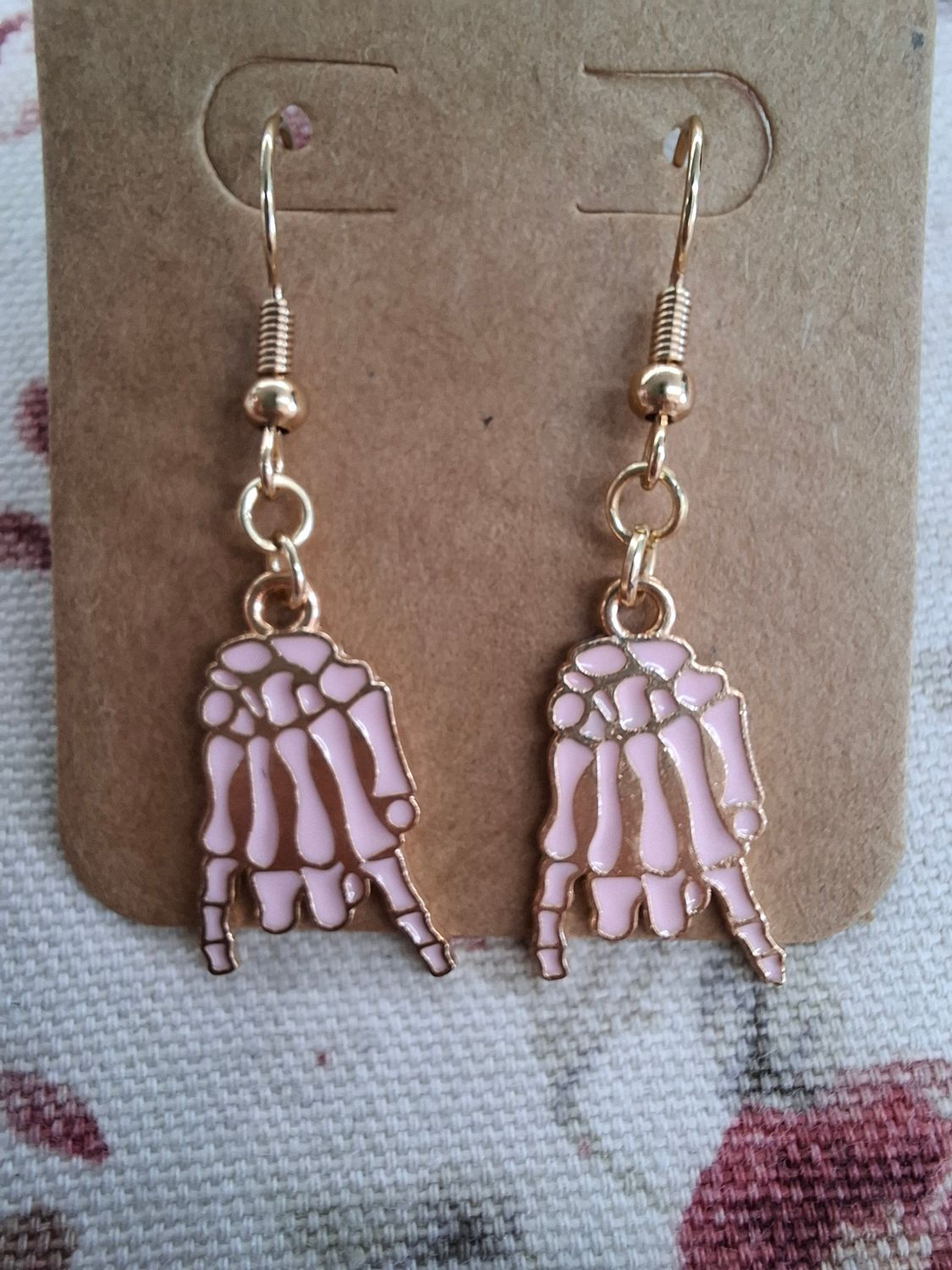 "Rad to the Bone" Halloween skeleton hand earrings