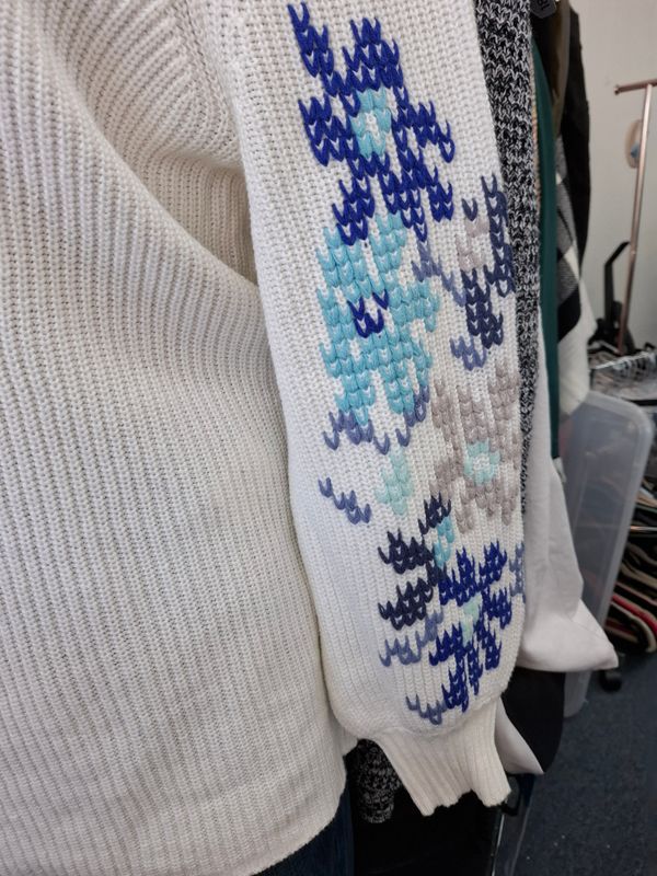 2x Lane Bryant white sweater with details on arm