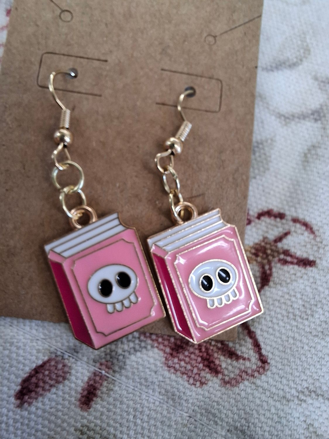 "Book of Skulls" pink Halloween book earrings gold