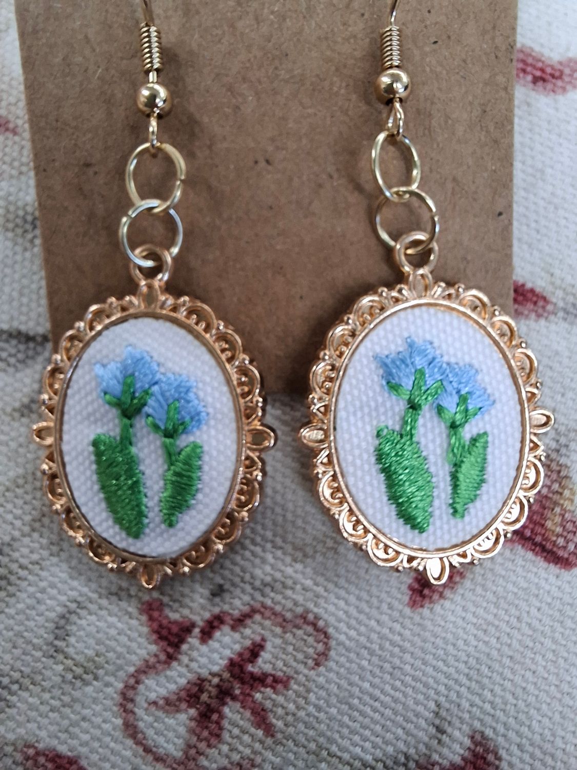 Gold cameo embroidered blue green flower earrings
