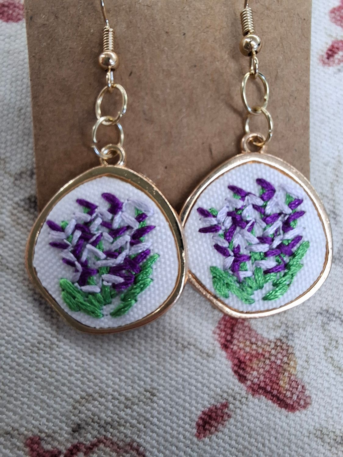 Gold trim embroidered purple green floral earrings