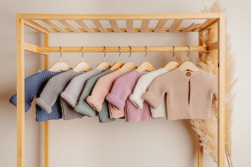 DLUX Baby Adorbale Elf Knitted Cardigan in soft cotton with wooden button closure.