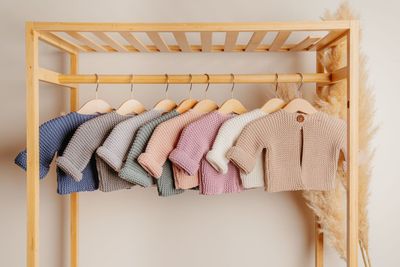 DLUX Baby Adorbale Elf Knitted Cardigan in soft cotton with wooden button closure.