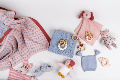 Handcrafted DLUX Baby Toys - soft knitted rattles and comforters