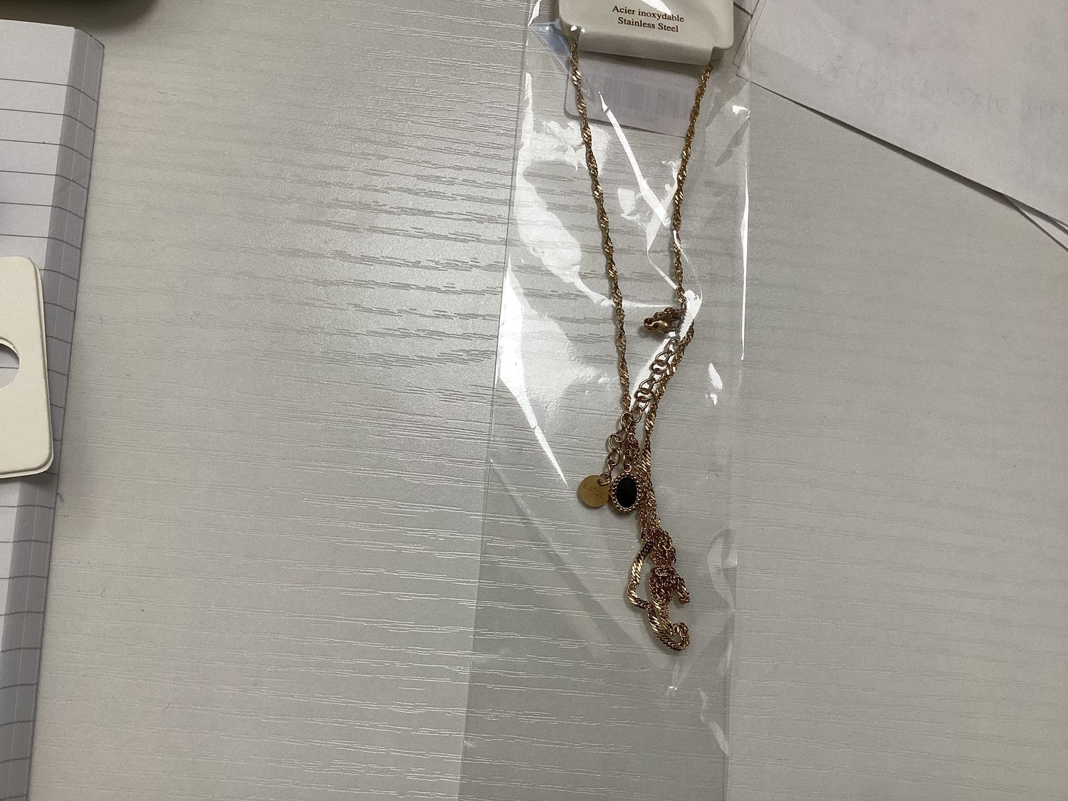 Black oval pendant necklace